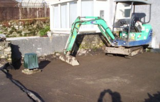 LIGHT WORK: Hiring a mini-digger with driver is a cost-effective way of clearing large amounts of ground and ensuring you have the basis for good foundations